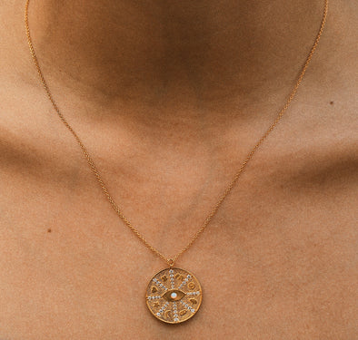 Gold Coin Eye Pendant